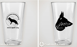 pint glass with austin german shepherd logo and silohoutte of a german shepherd